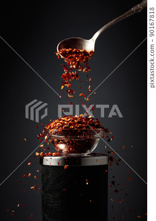 Flakes of red hot chili pepper. Flakes of red hot chili pepper. 90167818
