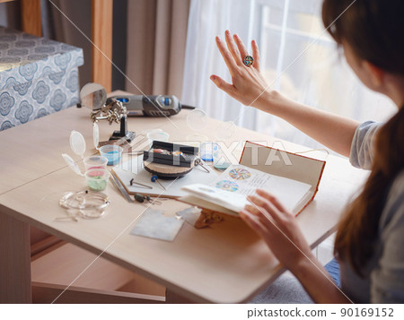 Jewelry designer workplace at home. 90169152