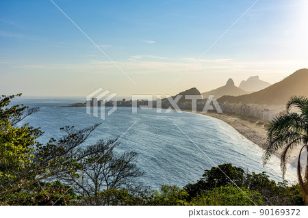 Copacabana beach and Rio de Janeiro mountains 90169372