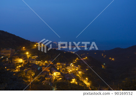 Cityscape at dusk overlooking the Keelung Harbor from Jiufen Taiwan Cityscape at dusk overlooking the Keelung Harbor from Jiufen Taiwan 90169552