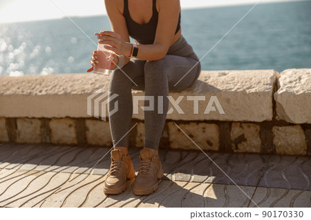 Caucasian fit female engaged in sports at sea Caucasian fit female engaged in sports at sea 90170330