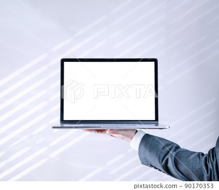 Man laptop screen mockup. Businessman holding notebook. Empty blank mockup computer screen on white background. Monitor template for mock up. Man laptop screen mockup. Businessman holding notebook. Empty blank mockup computer screen on white background. Monitor template for mock up. 90170353