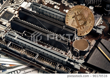 The coin of bitcoin lies on video card with dollars. Exchange bitcoin cash for a dollar The coin of bitcoin lies on video card with dollars. Exchange bitcoin cash for a dollar 90170516