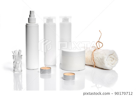 Set of cosmetic products in white containers on light background. Set of cosmetic products in white containers on light background. 90170712