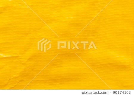 Yellow plastic bag texture background. Yellow plastic bag texture background. 90174102