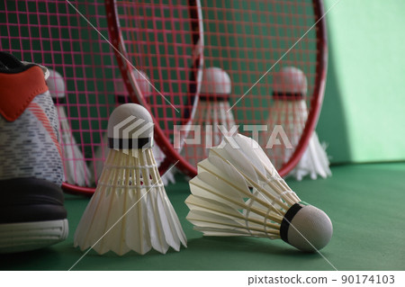 Badminton sports equipments, racket, shuttlecocks and shoes, on court, Badminton sports equipments, racket, shuttlecocks and shoes, on court, 90174103