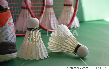 Badminton sports equipments, racket, shuttlecocks and shoes, on court, Badminton sports equipments, racket, shuttlecocks and shoes, on court, 90174104