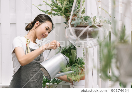 Women who take care of plants, gardening 90174664
