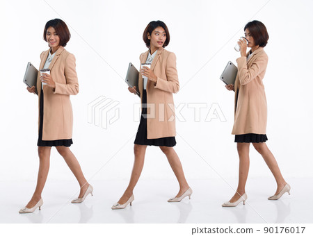 Full length 20s young Asian Business Woman businesswoman wear blazer skirt, walking forward right 90176017