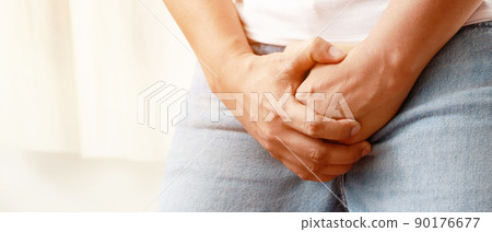 man covers groin, health problems disease for premature ejaculation, fertility, erection. The concept of protection of sexually transmitted infections. prostate problem testicular cancer. 90176677