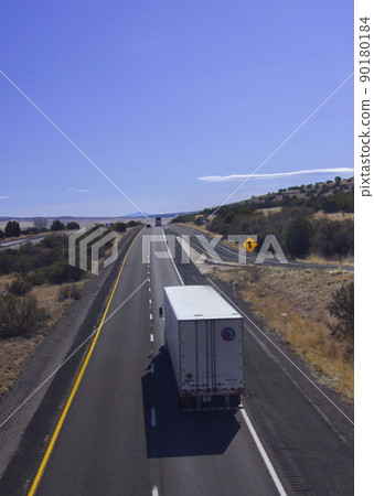 Road in the wilderness of America, seen from above 90180184
