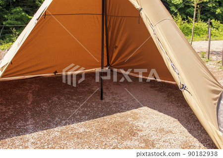 Inside a one-pole tent with nothing on it Inside a one-pole tent with nothing on it 90182938