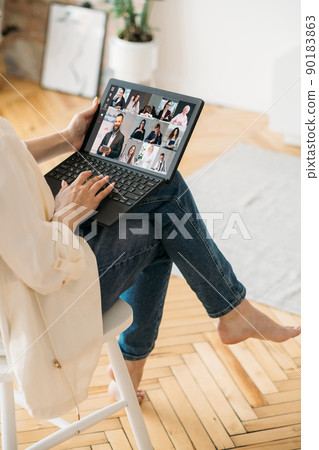 Online teamwork. Video chat. Corporate teleconference. Business colleagues discussing project on laptop screen at home digital office. 90183863