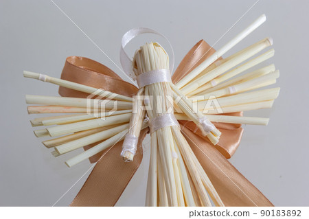 Tradition angels from handmade straw. National traditions of Ukraine.Christmas angel. Christmas straw ornament isolated on white background. Happy New Year and Merry Christmas card 90183892