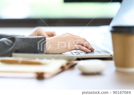 Female body parts keyboard doing desk work 90187069