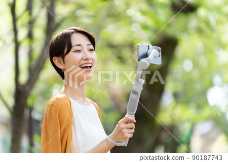 Fresh green smartphone delivery Vlog women 90187743