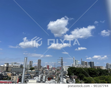 Cityscape of Saitama City seen from the rooftop parking lot of a shopping mall 90187744
