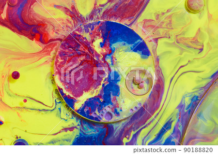 Circle with smaller circle and orbs on multicolored rainbow liquid surface Circle with smaller circle and orbs on multicolored rainbow liquid surface 90188820