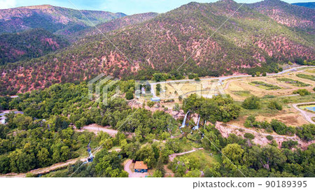 Large triple waterfall in desert park 90189395