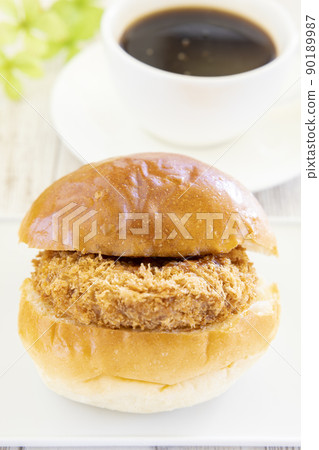 Delicious Menchi-katsu sandwich and coffee Delicious Menchi-katsu sandwich and coffee 90189987
