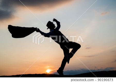 man silhouette jump and dance on sky background. confident businessman running. daily motivation man silhouette jump and dance on sky background. confident businessman running. daily motivation 90190873