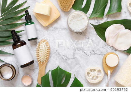 Natural cosmetics and skin and hair care accessories near monstera leaves, mockup Natural cosmetics and skin and hair care accessories near monstera leaves, mockup 90193762