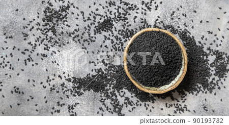 Indian spice Black cumin (nigella sativa or kalonji) seeds in bowl top view Indian spice Black cumin (nigella sativa or kalonji) seeds in bowl top view 90193782