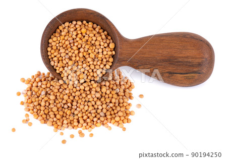 Mustard seeds in wooden spoon, isolated on white background. Pile of dry mustard grains. Mustard seeds in wooden spoon, isolated on white background. Pile of dry mustard grains. 90194250