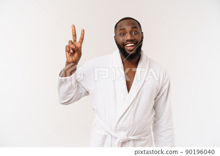 Closeup portrait happy, excited, successful young man giving peace, victory or two sign, isolated white background 90196040