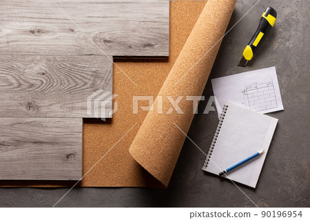 Wood laminate and cork on cement floor background texture. Wooden laminate 90196954