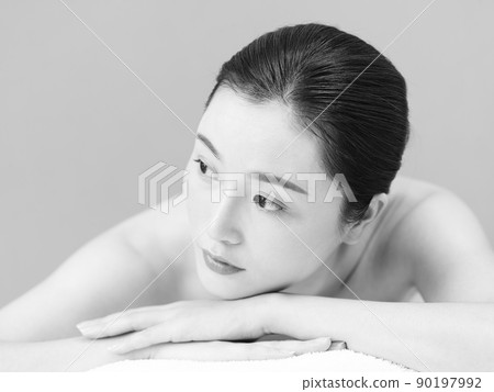 portrait of beautiful young asian woman, black and white, isolated on gray background 90197992