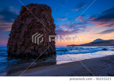 Fyriplaka beach on sunset, Milos island, Cyclades, Greece Fyriplaka beach on sunset, Milos island, Cyclades, Greece 90201025