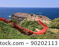 Beautiful red torii gate of Motonosumi Shrine and superb view of the blue Sea of Japan, Nagato City, Yamaguchi Prefecture 90202113