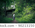 Abandoned train station and women 90213150