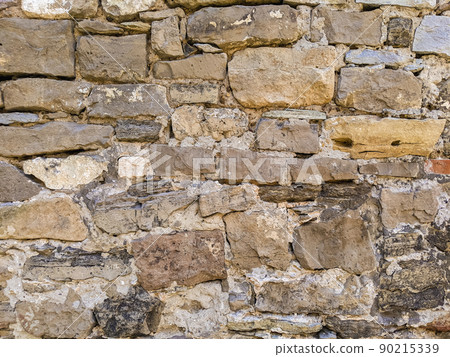 texture of a sandstone wall close-up 90215339