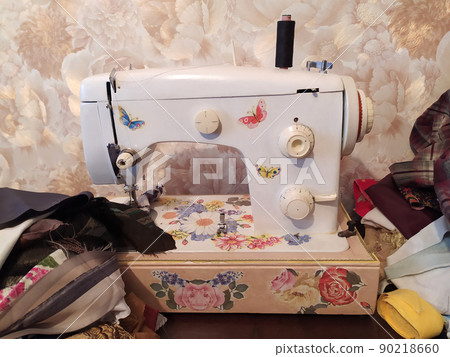 Home work on sewing machine. Handmade fashion equipment. 90218660