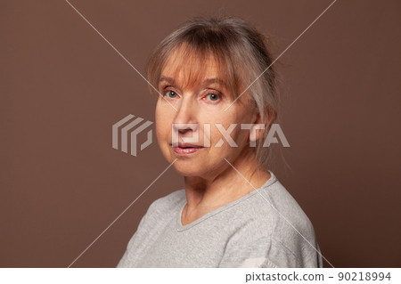 Portrait of a tired mature woman, female face close up 90218994