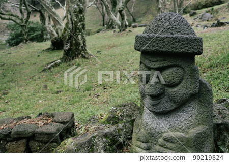 Dol hareubang stone grandpa sculpture at Halla Arboretum in Jeju Island, Korea Dol hareubang stone grandpa sculpture at Halla Arboretum in Jeju Island, Korea 90219824