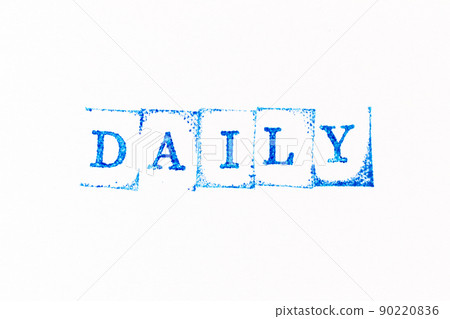Blue color ink rubber stamp in word daily on white paper background Blue color ink rubber stamp in word daily on white paper background 90220836
