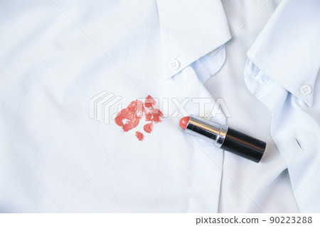dirty lipstick stain on cloth from daily life activity for cleaning concept. housework care living dirty lipstick stain on cloth from daily life activity for cleaning concept. housework care living 90223288