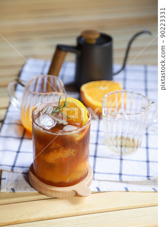 drinking preparing of making orange americano coffee in free time of people living life drinking preparing of making orange americano coffee in free time of people living life 90223331