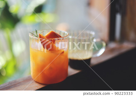 homemade orange Americano coffee from free time making drink for healthy living life.  90223333