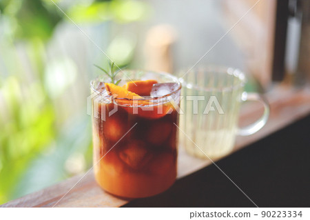 homemade orange Americano coffee from time making drink for healthy living life. selective focus 90223334