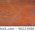 Textured background Red-brown wall with peeled paint 90223686