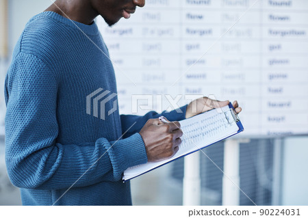 African American Male Holding Clipboard 90224031