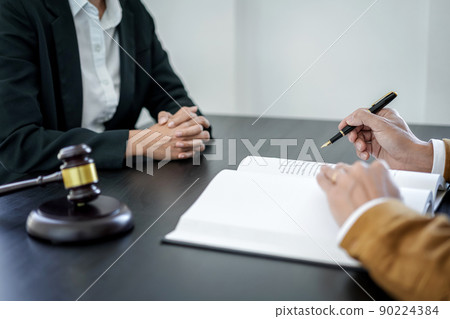 Male lawyer or notary working consulting and discussion to businesswoman client in the office, Law and Legal services concept 90224384