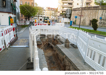 Orange construction Street barrier light on barricade. Road construction on the streets of European cities. Germany. Mainz. 90224788