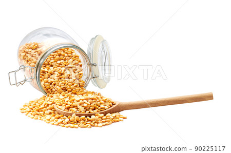 dried peas in wooden scoop and in glass storage jar isolated on white background. dried peas in wooden scoop and in glass storage jar isolated on white background. 90225117