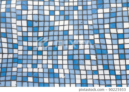 Close up picture of small square blue and white shiny ceramic tiles. Background, bathrooms and pools walls and floor design. Close up picture of small square blue and white shiny ceramic tiles. Background, bathrooms and pools walls and floor design. 90225933
