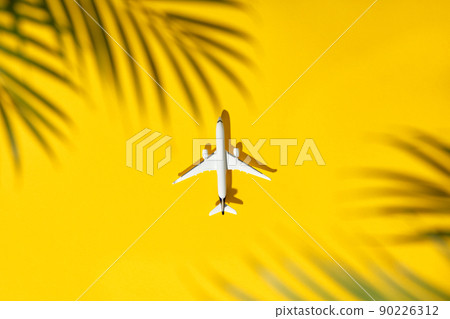 Flat lay traveler accessories on yellow background with blank space for text. Top view travel or vacation concept. Summer background 90226312